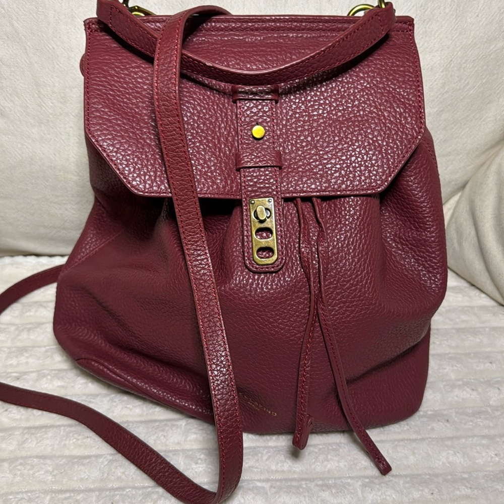 Polished pebbled leather refines the cool look of this luxe Liebeskind backpack